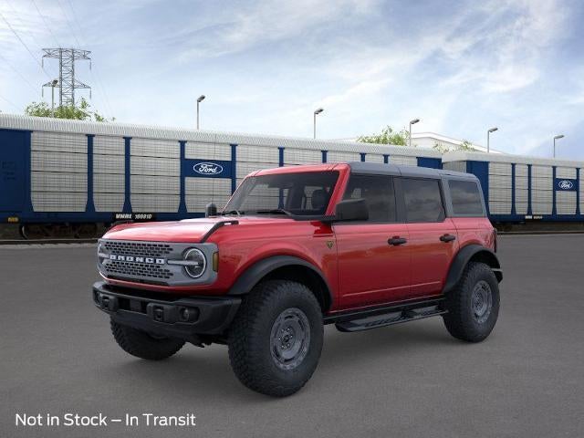 2025 Ford Bronco Badlands 4 Door Advanced 4x4 in Ruby Red Metallic Tinted Clearcoat — front three-quarter view