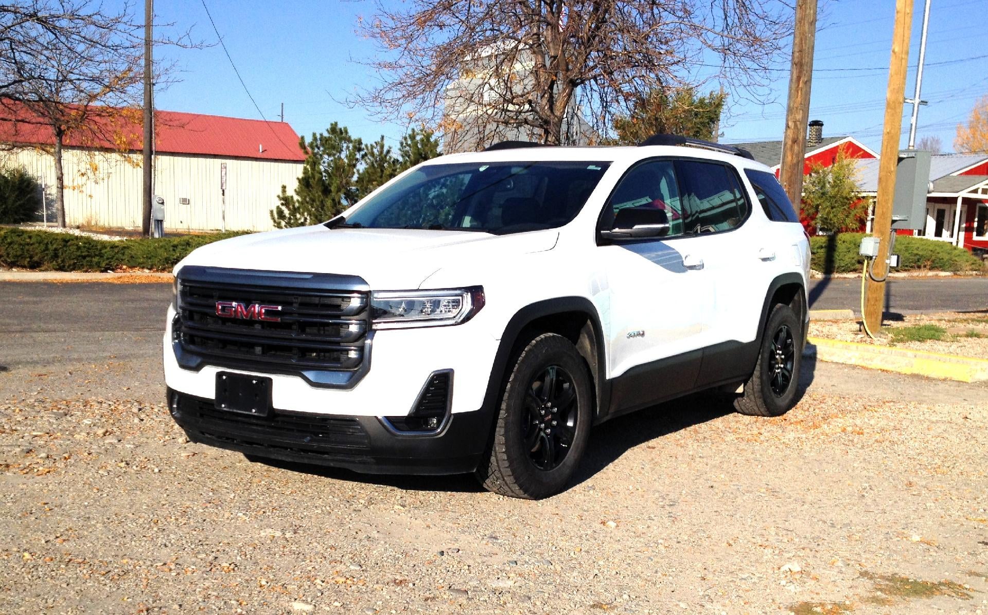 2021 GMC Acadia AWD AT4 in Summit White — front three-quarter view