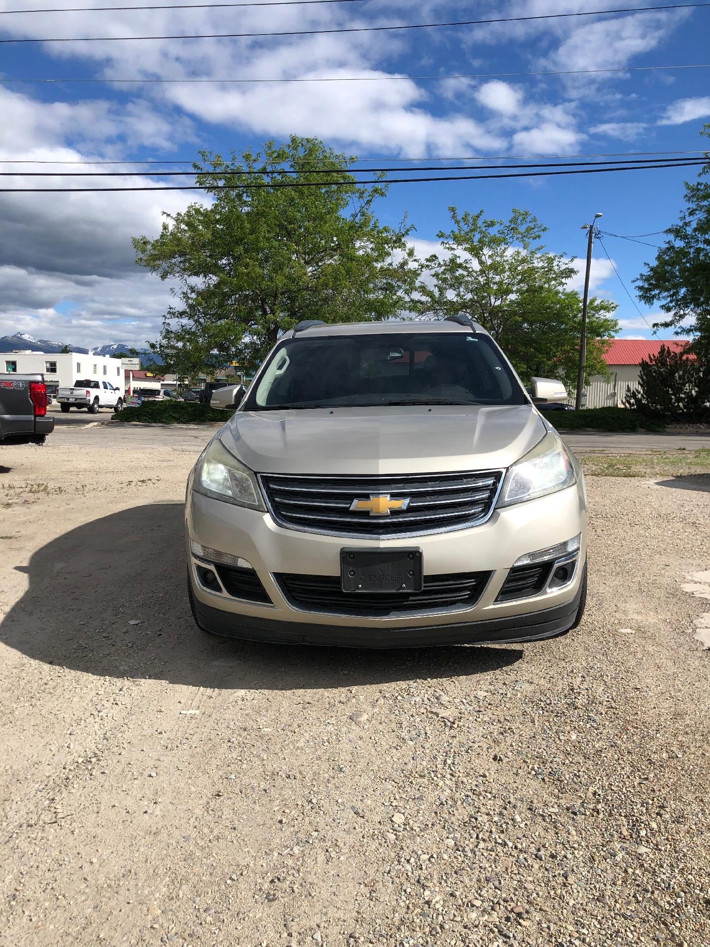 2015 Chevrolet Traverse AWD 1LT in Tan — front three-quarter view