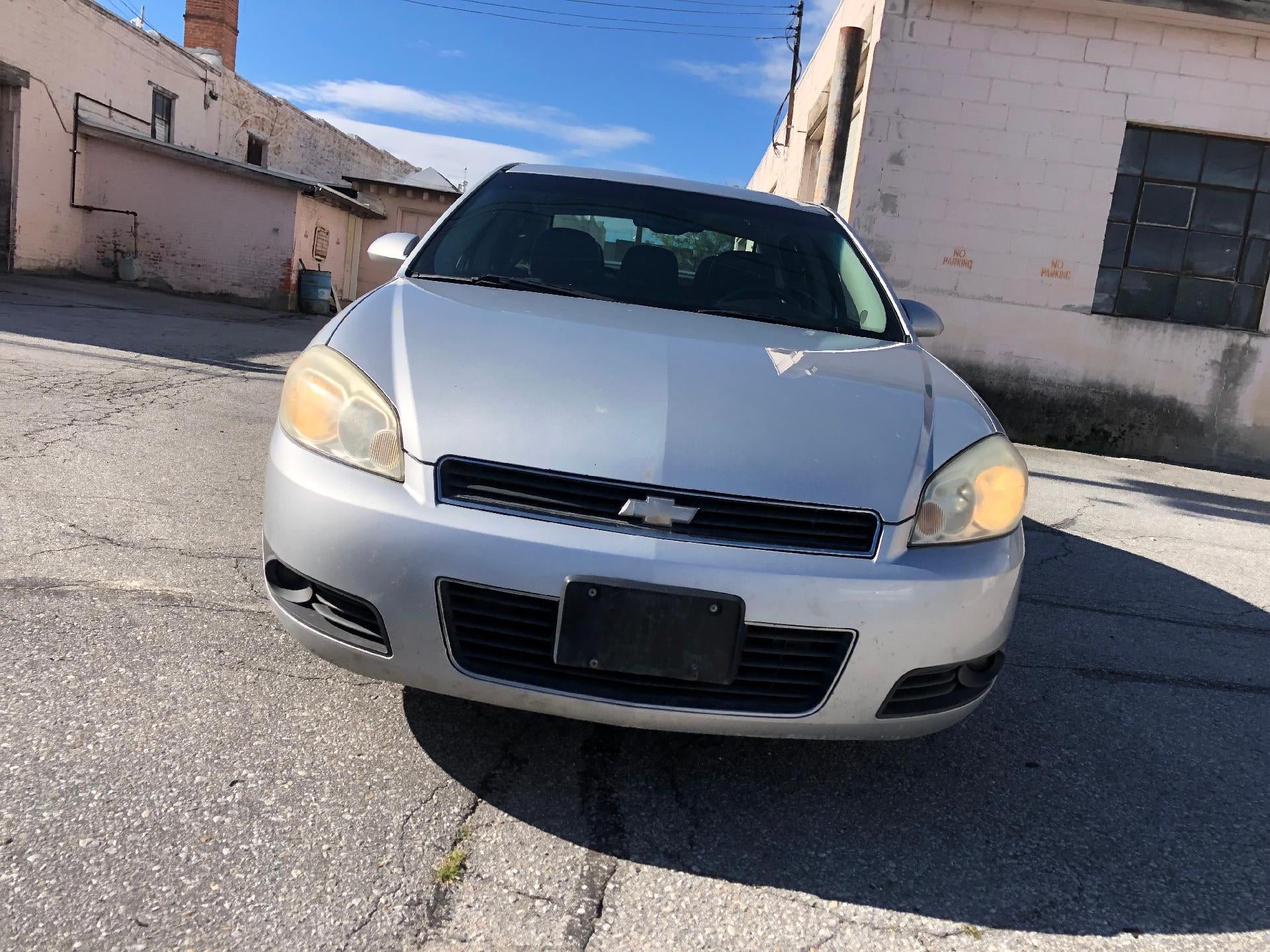 2011 Chevrolet Impala LT in Silver Ice Metallic — front three-quarter view